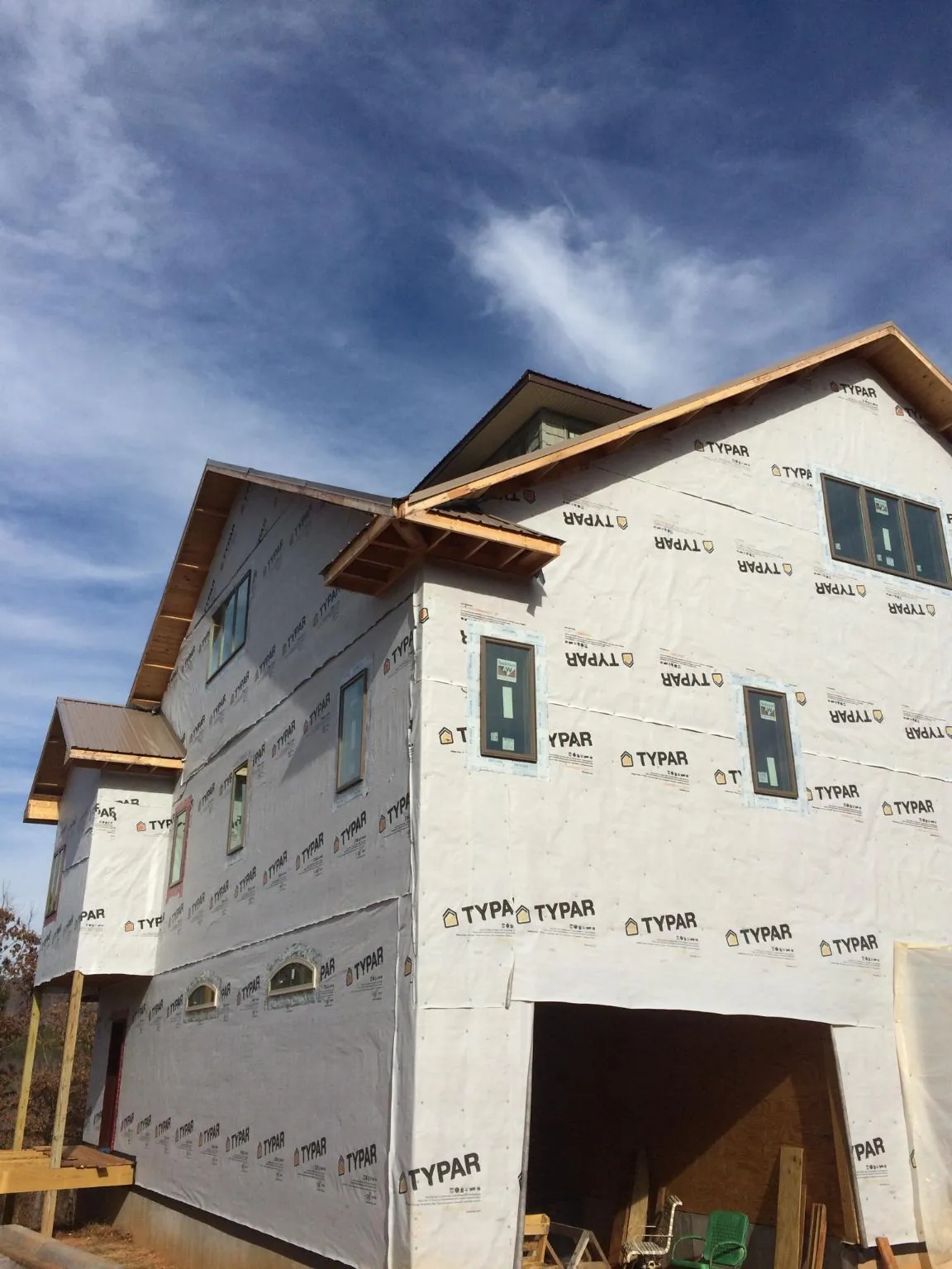 Stick built house wrapped in Typar with new roof framing and dormers in Wyndmere
